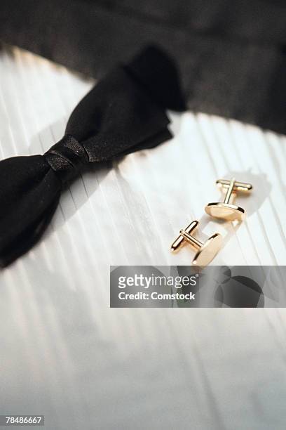 cufflinks and tuxedo bow tie - dinner jacket stock pictures, royalty-free photos & images