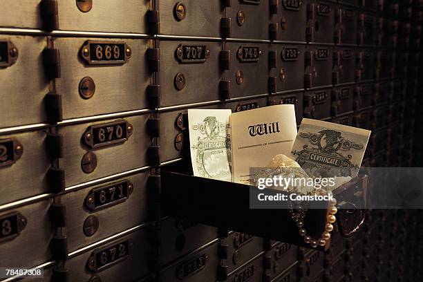 open safe deposit box in bank vault - safe deposit box stock pictures, royalty-free photos & images