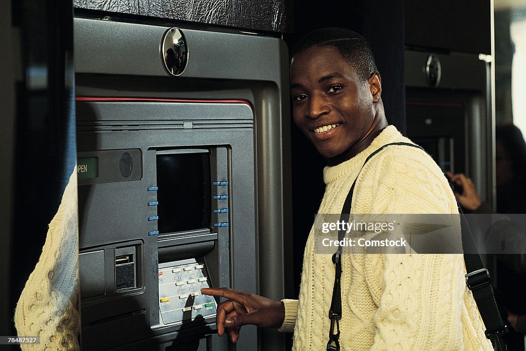 Man at ATM machine