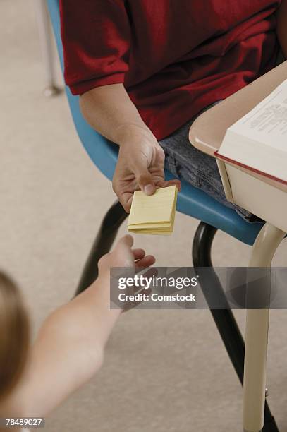 Passing Through Notes Kids Passing Notes Photos and Premium High Res Pictures - Getty Images