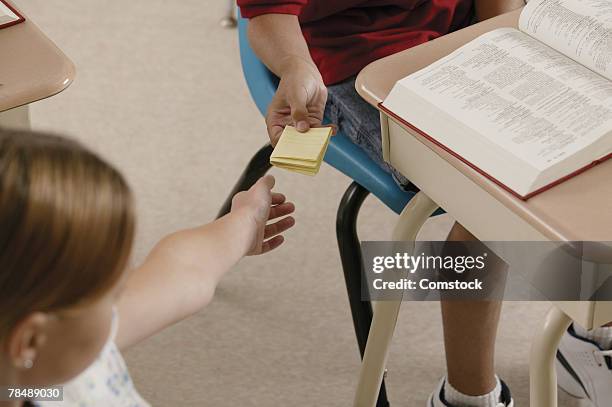 Kids Passing Note In Class Photos and Premium High Res Pictures - Getty ...