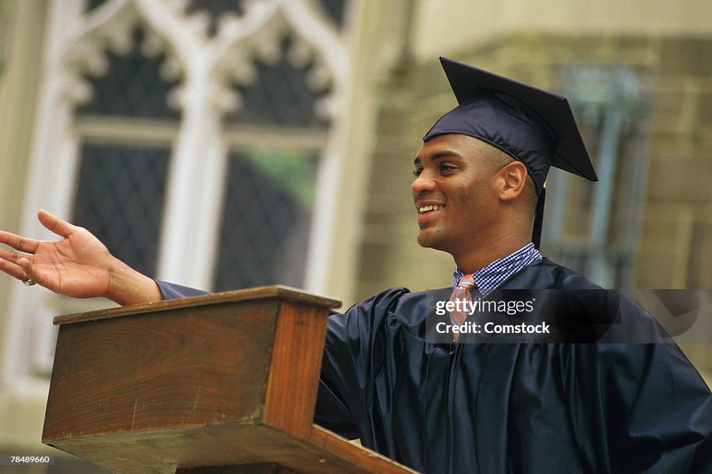 Young man giving graduation speech