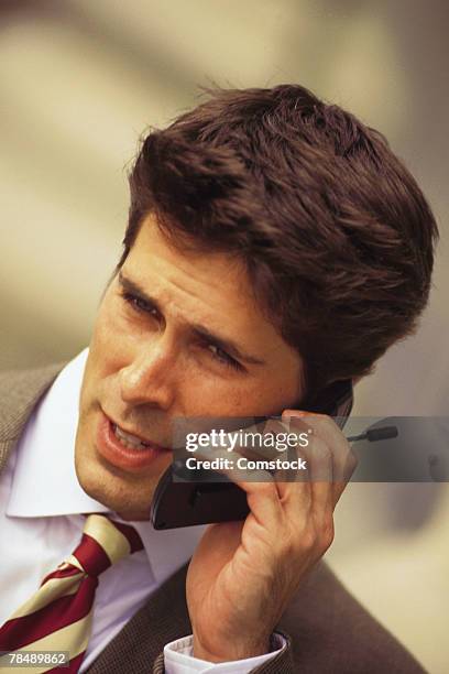 businessman talking on cell phone - 90s cell phone bildbanksfoton och bilder