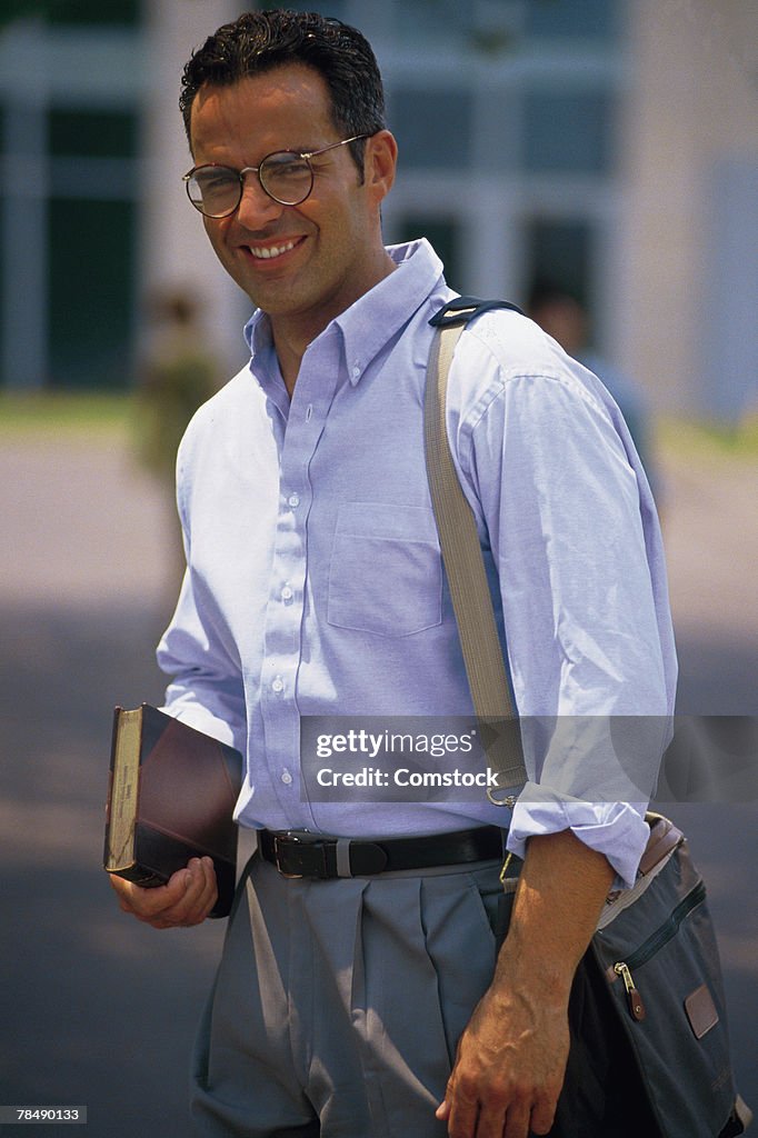 Man posing on campus