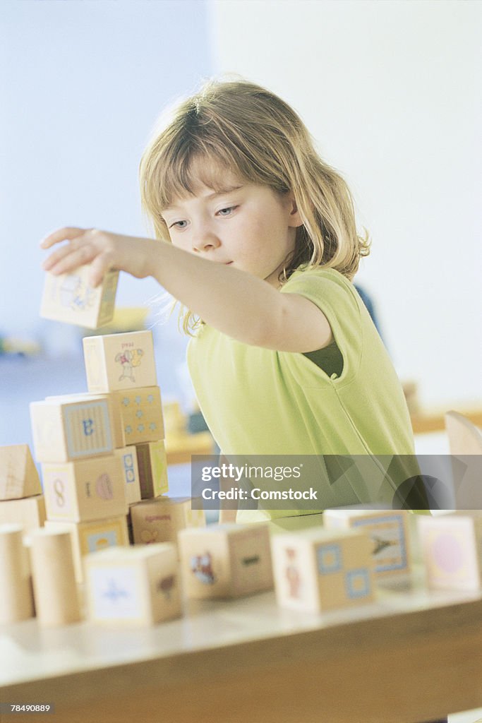 Girl playing with blocks