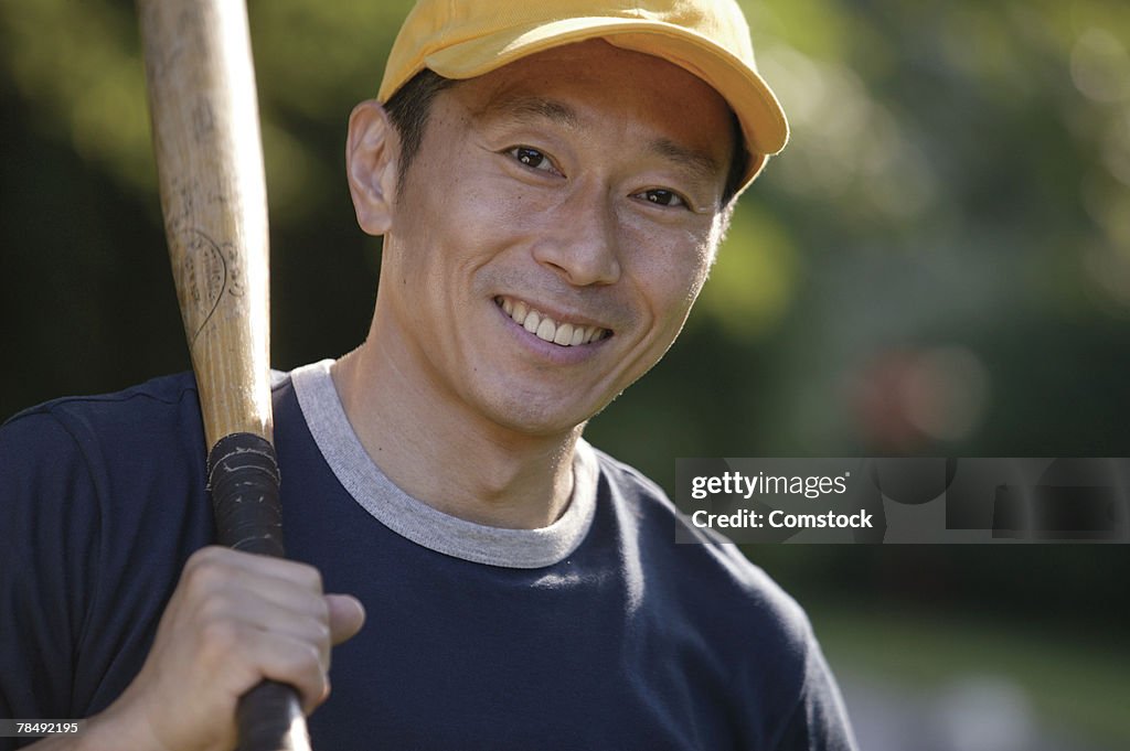 Man with baseball gear