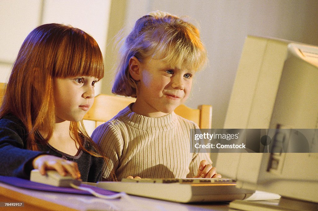 Girls using desktop computer