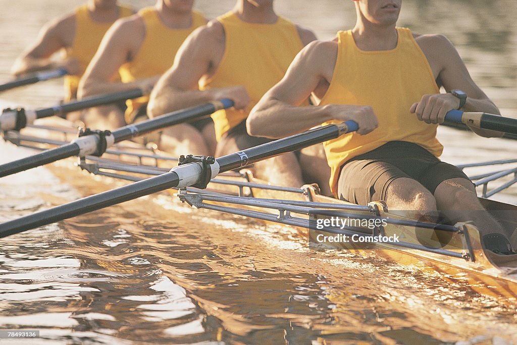 Crew team rowing a scull