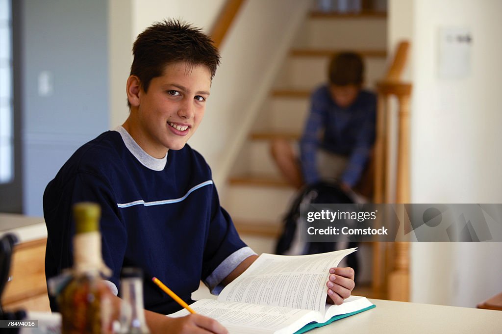 Teenage boy doing homework