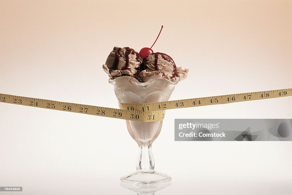 Ice cream sundae and tape measure