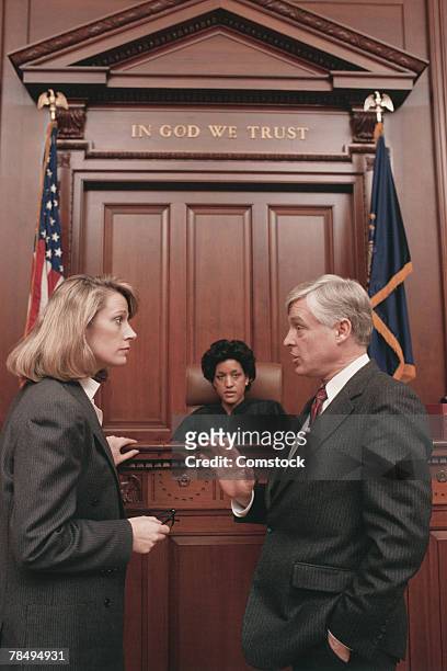 judge and lawyers in courtroom - lawyers arguing stock pictures, royalty-free photos & images