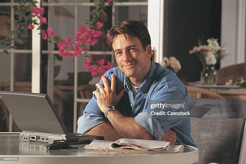 Man sitting with laptop