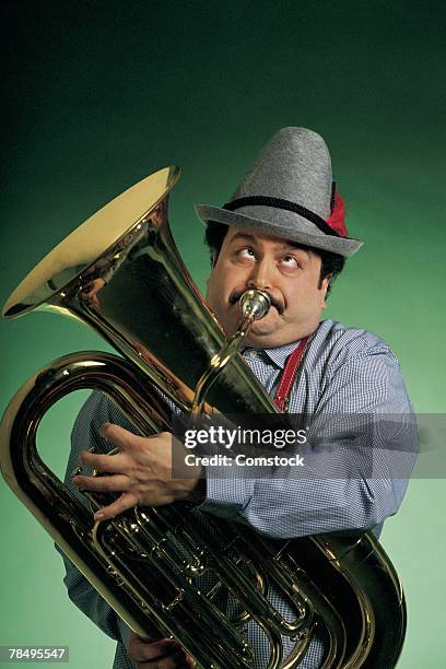 man playing tuba - tuba imagens e fotografias de stock