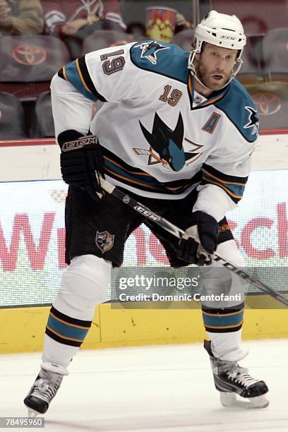 Joe Thornton of the San Jose Sharks looks on during the NHL game against the Phoenix Coyotes at the Jobing.com Arena on December 7, 2007 in Phoenix,...