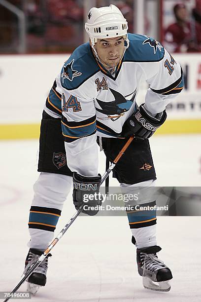 Jonathan Cheechoo of the San Jose Sharks looks on during the NHL game against the Phoenix Coyotes at the Jobing.com Arena on December 7, 2007 in...