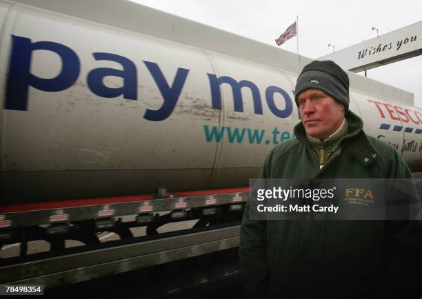 Farmers For Action Chairman and fuel price protester David Handley watches as a tanker enters the Texaco oil refinery on December 15, 2007 in...