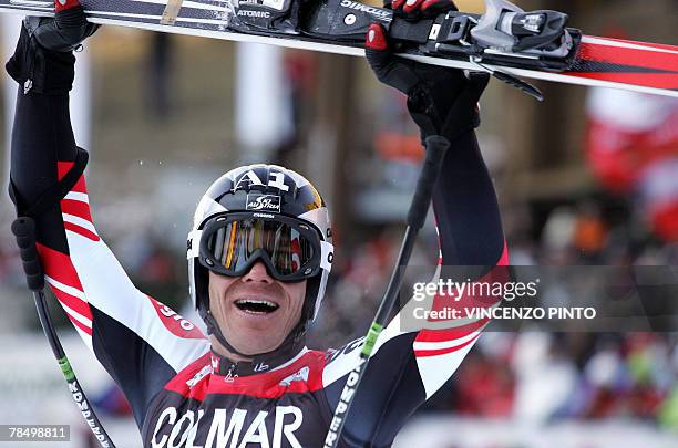 Austrian Michael Walchhofer celebrates in the finish area of the Mens FIS Alpine World Cup Downhill event in Val Gardena, 15 December 2007 after...