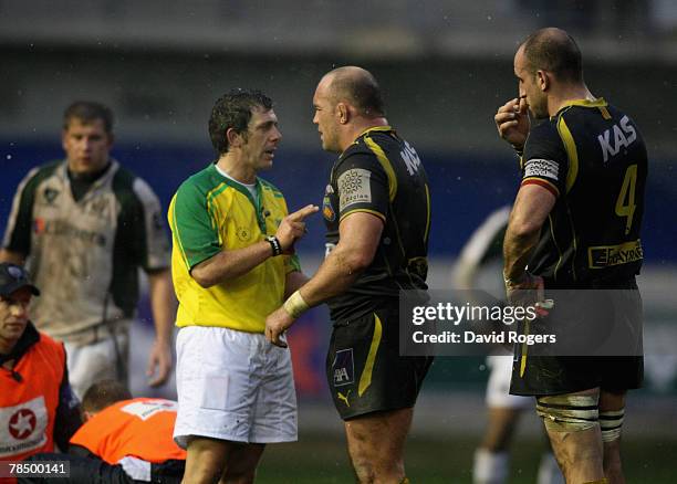 Carlo Damasco, the referee, warns Perpignan captain Perry Freshwater after he punched Kieran Roche during the Heineken Cup match between Perpignan...
