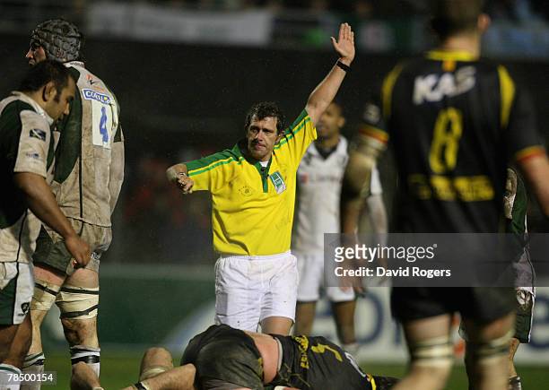 Carlo Damasco, the referee, awards a penalty during the Heineken Cup match between Perpignan and London Irish at Stade Aime Giral on December 15,...