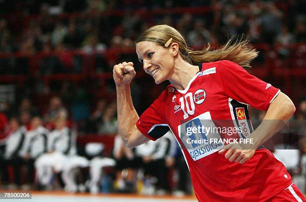 Norway's Gro Hammerseng reacts after scoring a goal during the women world championship handball semi final match Norway vs. Germany, 15 December...