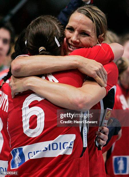 Gro Hammerseng and Else-Marthe Lybekk of Norway celebrate after the Women's Handball World Championship semi final match between Germany and Norway...