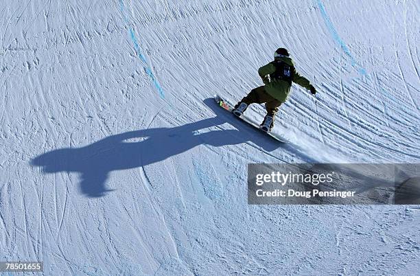 Kevin Pearce of the USA rides up the wall of the pipe during the finals of the Chevrolet U.S. Snowboard Grand Prix in the Freeway Half Pipe on...