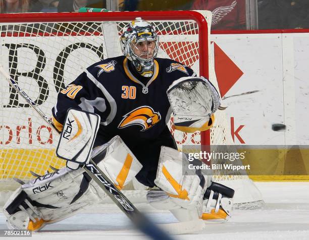 Ryan Miller of the Buffalo Sabres makes a glove save against the Chicago Blackhawks at HSBC Arena December 15, 2007 in Buffalo, New York.