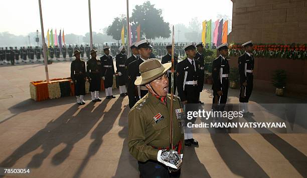 Indian soldiers pay respects to Indian soldiers killed during the 1971 Indo-Pakistan war at Amar Jawan Jyoti, India Gate in New Delhi, 16 December...