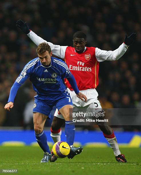 Andriy Shevchenko of Chelsea shields the ball from Kolo Toure of Arsenal during the Barclays Premier League match between Arsenal and Chelsea at the...
