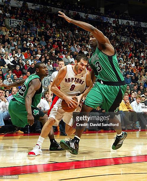 Kendrik Perkins of the Boston Celtics guards against Jose Calderon of the Toronto Raptors on December 16, 2007 at the Air Canada Centre in Toronto,...