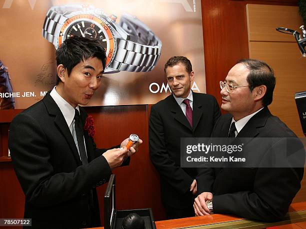 Musical pop star and Omega Ambassador Richie Jen, Omega Brand President USA, Gregory Swift and president and owner of Carat & Karat, Allen Mon at the...