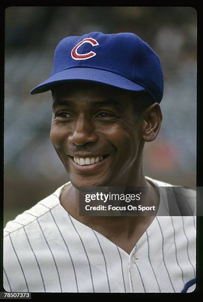 S: Shortstop Ernie Banks of the Chicago Cubs smiling before a circa late 1960's Major League Baseball game at Wrigley Field in Chicago, Illinois....