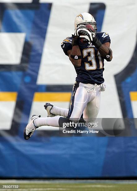 Antonio Cromartie of the San Diego Chargers makes an interception against the Detroit Lions during the fourth quarter at Qualcomm Stadium December...