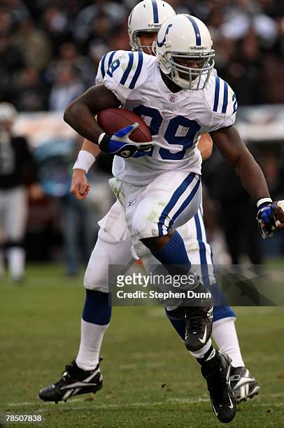 Running back Joseph Addai of the Indianapolis Colts carries the ball against the Oakland Raiders at McAfee Coliseum December 16, 2007 in Oakland,...