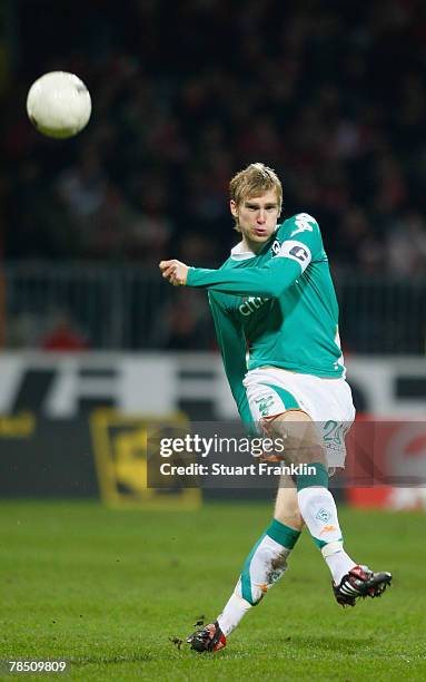 Per Mertesacker of Bremen in action during the Bundesliga match between Werder Bremen and Bayer Leverkusen at the Weser stadium on December 15, 2007...