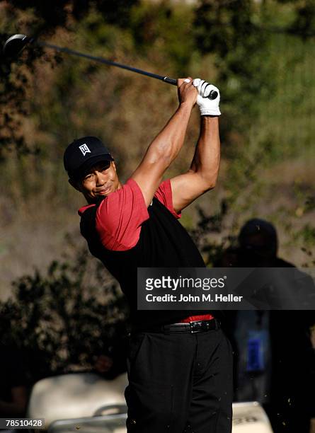 Tiger Woods drives his ball off the sixth tee in the final round of play in the Target World Challenge at Sherwood Country Club on December 16, 2007...