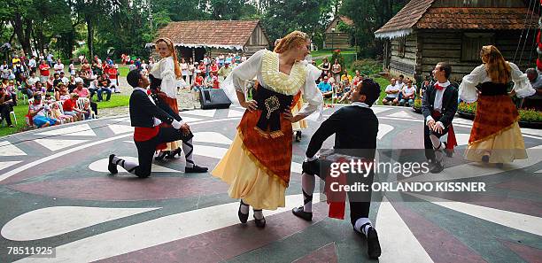 Portuguese descendants perform traditional dances during the Ethnics Dance festival, 16 December 2007, in Curitiba, Brazil as part of the Christmas...