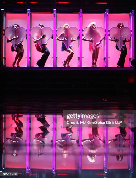 Melanie Brown, Melanie Chisholm, Geri Halliwell, Emma Bunton and Victoria Beckham of The Spice Girls perform on stage during The Return of Spice...