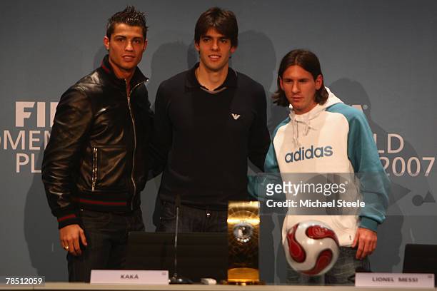 Cristiano Ronaldo of Manchester United and Portugal stands alongside Kaka of AC Milan and Brazil and Lionel Messi of Barcelona and Argentina during...