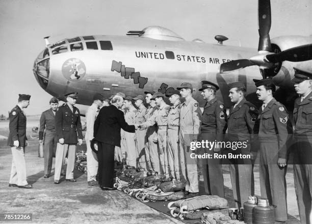 British Prime Minister Clement Attlee inspects the crew of a US Boeing B-50 Superfortress bomber nicknamed 'Nifty 50' at RAF Marham in Norfolk, 4th...