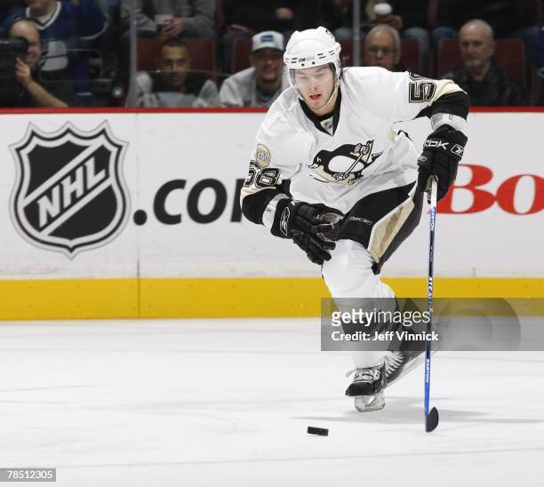 Kris Letang of the Pittsburgh Penguins skates up ice during their game against the Vancouver Canucks at General Motors Place on December 8, 2007 in...