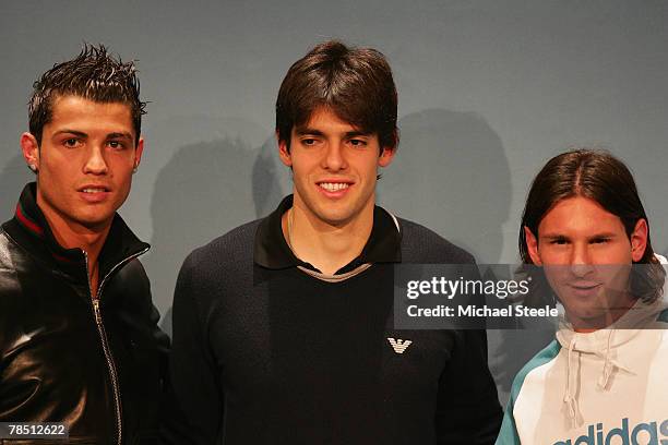 Cristiano Ronaldo of Manchester United and Portugal poses alongside Kaka of AC Milan and Brazil and Lionel Messi of Barcelona and Argentina during...