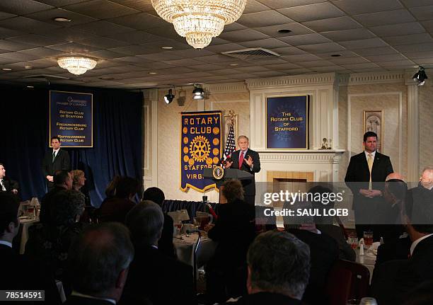 President George W. Bush speaks on the economy at Yak-A-Doos at Holiday Inn Fredericksburg in Fredericksburg, Virginia, 17 December 2007. AFP...