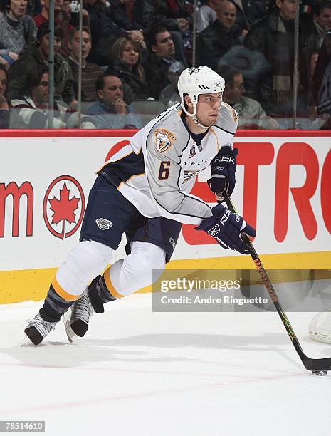 Shea Weber of the Nashville Predators stick-handles the puck against the Montreal Canadiens at Bell Centre on December 1, 2007 in Montreal, Quebec.