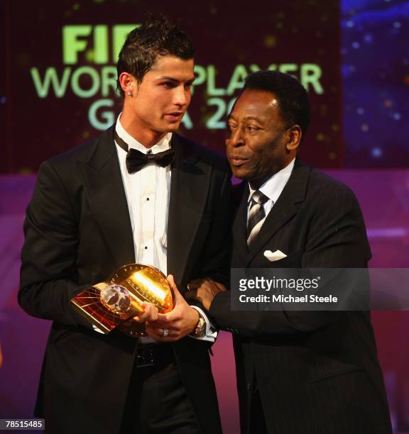 Cristiano Ronaldo of Manchester United and Portugal receives the third placed award from Pele during the FIFA World Player of The Year Gala 2007 at...