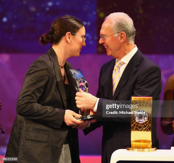 Birgit Prinz of Germany receives her bronze award from Franz Beckenbauer at the FIFA World Women's Player of The Year Gala 2007 at the Zurich Opera...