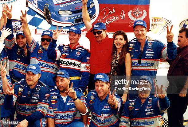 Dale Earnhart, Jr.'s team flashes the "two" sign from Victory Lane in 1999. Winning his first NASCAR Busch Series Championship in 1998 was nice, but...