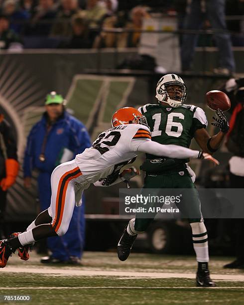 Wide Receiver Brad Smith of the New York Jets tries to make a catch in the End Zone against Defensive Back Brandon McDonald of the Cleveland Browns...
