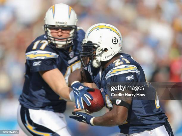 LaDainian Tomlinson of the San Diego Chargers grabs the hand-off against the Detroit Lions on December 16, 2007 at Qualcomm Stadium in San Diego,...