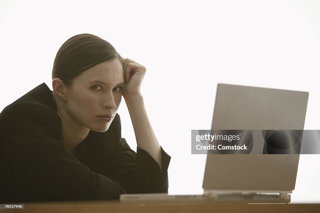 Portrait of businesswoman with laptop